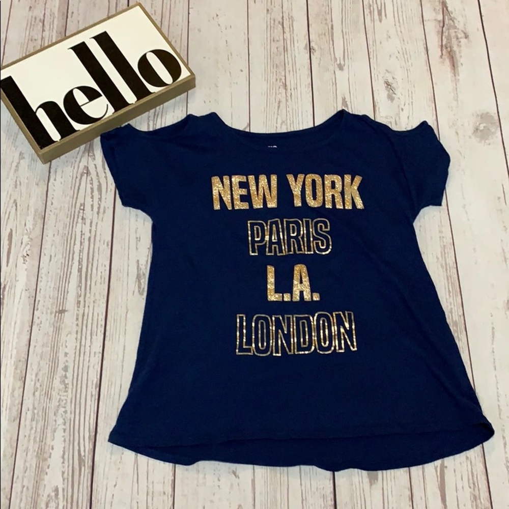 Girls short sleeve top size medium, peep shoulder